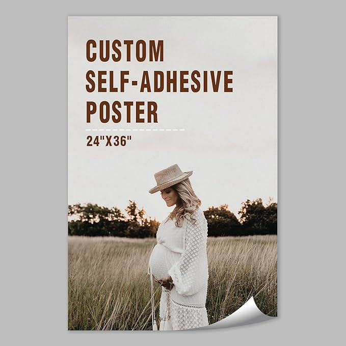 A poster featuring a pregnant woman in a white dress and hat standing in a grassy field, with the text Custom Self-Adhesive Poster 24x36 written in large brown letters at the top.